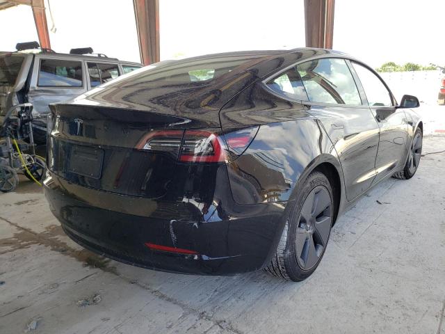 Photo 4 from auction – 2021 TESLA MODEL 3 with VIN 5YJ3E1EA4MF075426