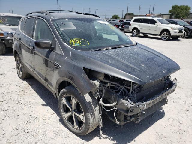 FORD ESCAPE SE 2017 with VIN 1FMCU9GD8HUC78482 - Photo from auction