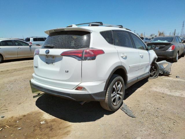 Photo 4 from auction – 2016 TOYOTA RAV4 LE with VIN JTMZFREVXGJ094732