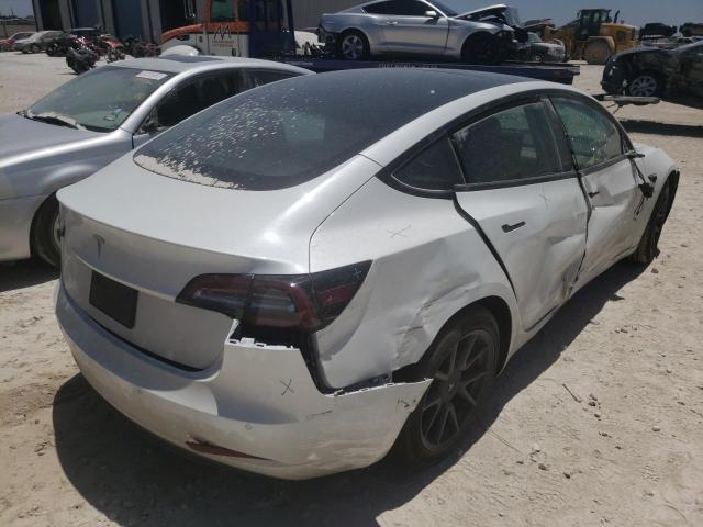 Photo 4 from auction – 2021 TESLA MODEL 3 with VIN 5YJ3E1EA4MF866622