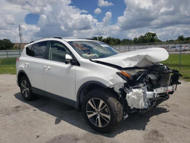 Photo 1 from auction – 2017 TOYOTA RAV4 XLE with VIN JTMWFREV4HJ127888