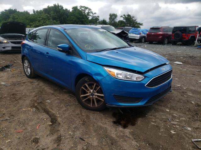 FORD FOCUS SE 2017 with VIN 1FADP3K2XHL228259 - Photo from auction