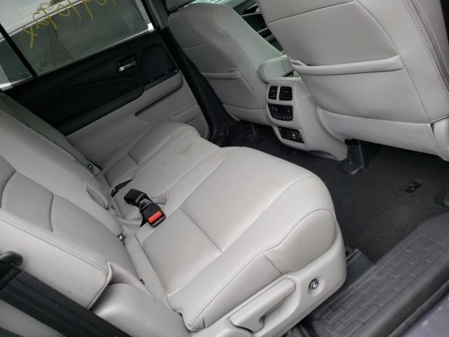 Photo 6 from auction – 2021 HONDA PILOT TOUR with VIN 5FNYF5H94MB019269