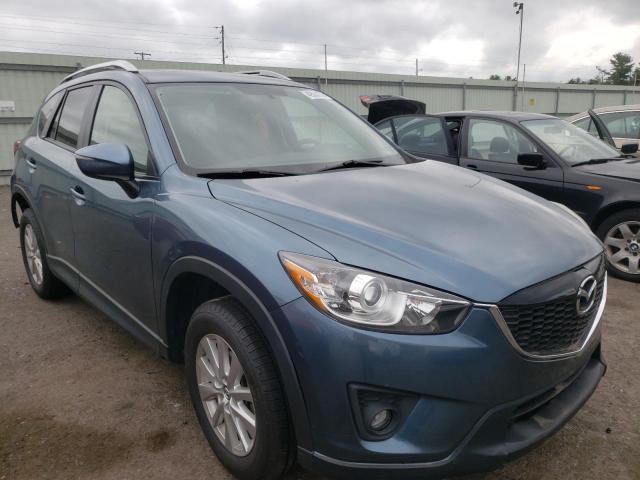 MAZDA CX-5 TOURI 2015 with VIN JM3KE4CY9F0552129 - Photo from auction