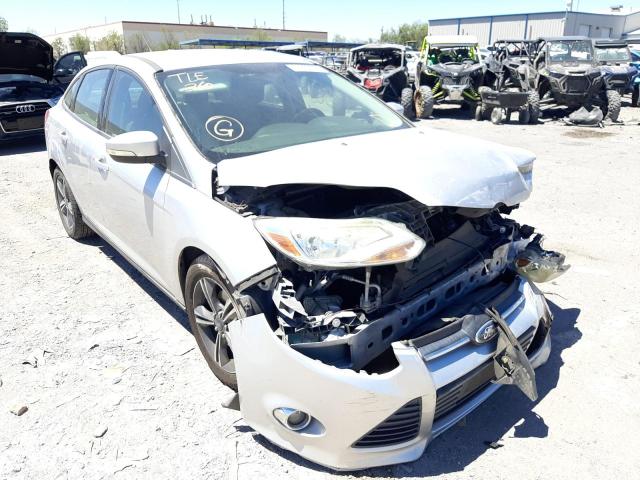 FORD FOCUS SE 2014 with VIN 1FADP3F23EL311778 - Photo from auction