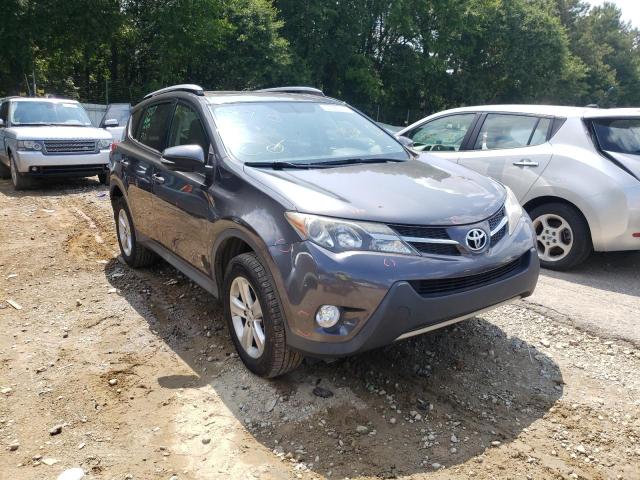 TOYOTA RAV4 XLE 2014 with VIN JTMWFREV3EJ014025 - Photo from auction