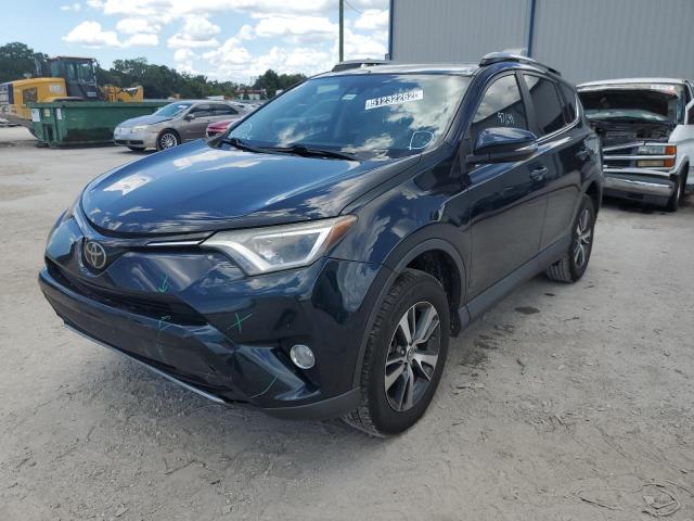 Photo 2 from auction – 2017 TOYOTA RAV4 XLE with VIN 2T3WFREVXHW381235