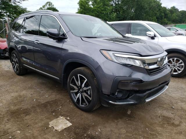 HONDA PILOT TOUR 2021 with VIN 5FNYF5H94MB019269 - Photo from auction