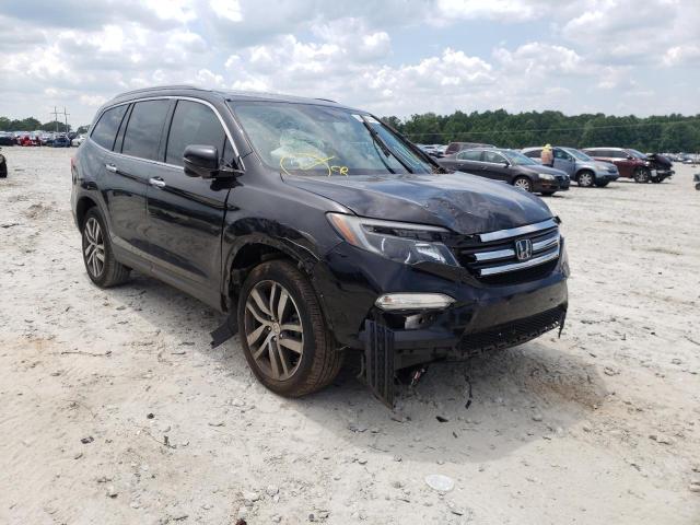 Photo 1 from auction – 2017 HONDA PILOT TOUR with VIN 5FNYF5H99HB010217