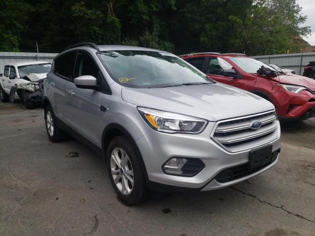 FORD ESCAPE SE 2018 with VIN 1FMCU9GDXJUC54142 - Photo from auction