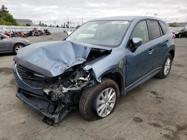 Photo 2 from auction – 2016 MAZDA CX-5 TOURI with VIN JM3KE2CY3G0652927