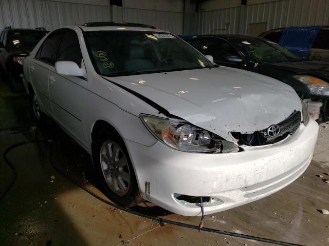 TOYOTA CAMRY LE 2003 with VIN 4T1BE32K33U252599 - Photo from auction