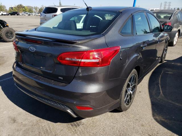 Photo 4 from auction – 2015 FORD FOCUS SE with VIN 1FADP3F24FL232024