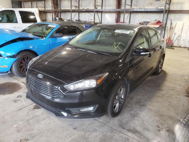 Photo 2 from auction – 2017 FORD FOCUS SE with VIN 1FADP3FE9HL235319