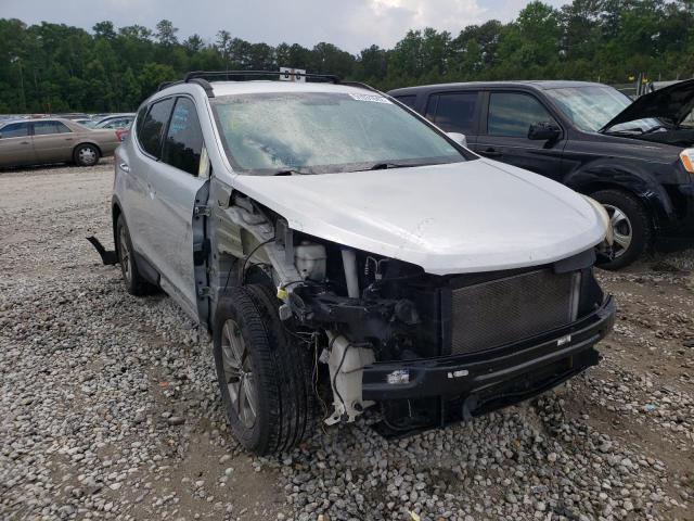 Photo 9 from auction – 2014 HYUNDAI SANTA FE S with VIN 5XYZU3LB2EG200213