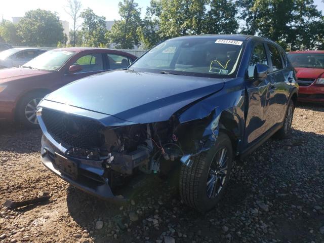 Photo 2 from auction – 2021 MAZDA CX-5 TOURI with VIN JM3KFBCM1M1403719