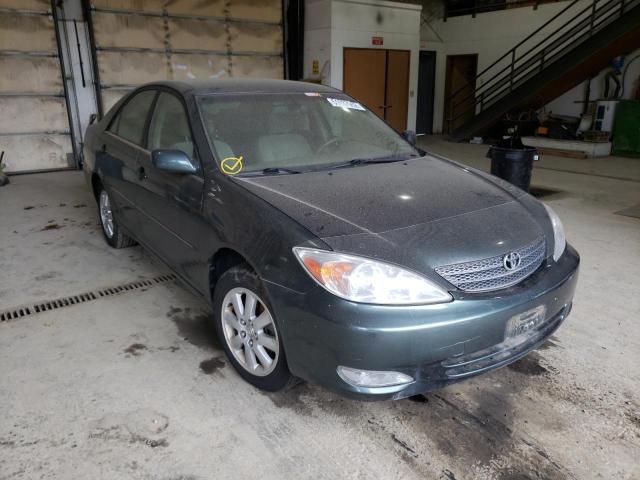 TOYOTA CAMRY LE 2003 with VIN JTDBE32K930145312 - Photo from auction