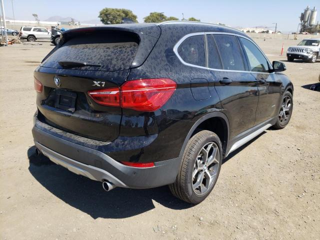 Photo 4 from auction – 2018 BMW X1 XDRIVE2 with VIN WBXHT3Z31J4A67005