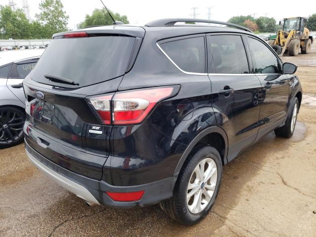 Photo 4 from auction – 2017 FORD ESCAPE SE with VIN 1FMCU0G91HUC24710