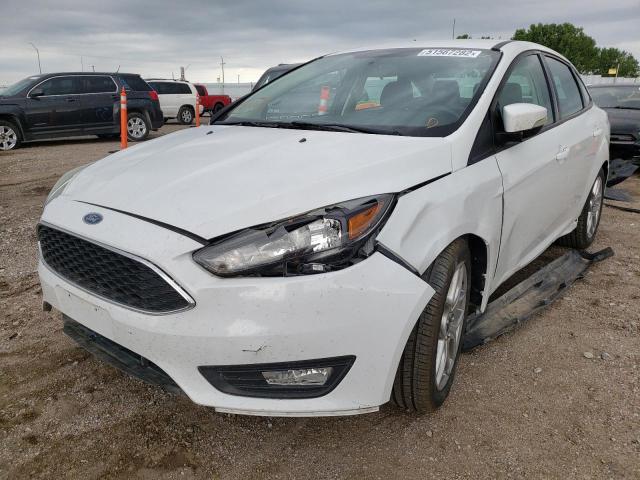 Photo 2 from auction – 2015 FORD FOCUS SE with VIN 1FADP3F20FL300755
