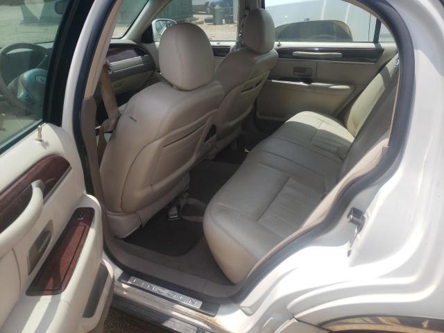 Photo 6 from auction – 2003 LINCOLN TOWN CAR E with VIN 1LNHM81W93Y690552