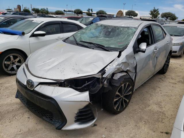 Photo 2 from auction – 2018 TOYOTA COROLLA L with VIN 5YFBURHE5JP802049