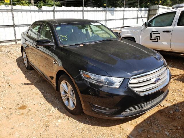 FORD TAURUS SEL 2017 with VIN 1FAHP2H8XHG128145 - Photo from auction