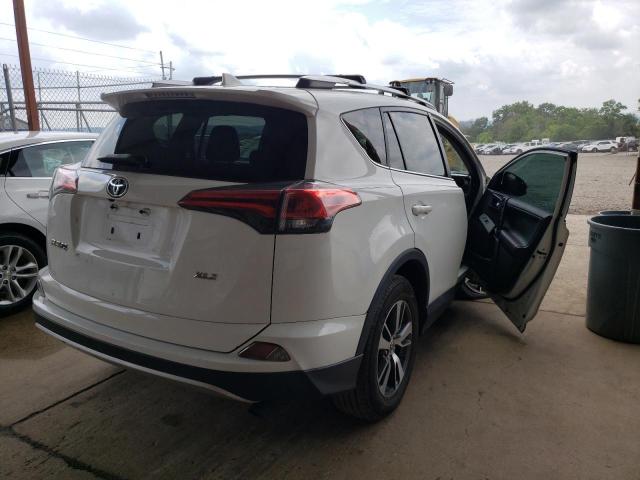 Photo 4 from auction – 2016 TOYOTA RAV4 XLE with VIN 2T3WFREV7GW249225