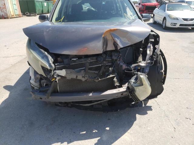 Photo 9 from auction – 2014 HONDA CR-V LX with VIN 3CZRM3H32EG716357