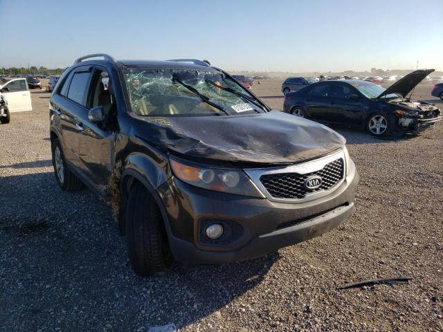 KIA SORENTO EX 2011 with VIN 5XYKU4A2XBG112323 - Photo from auction