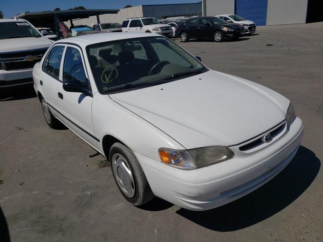 TOYOTA COROLLA VE 2000 with VIN 1NXBR12E4YZ383311 - Photo from auction