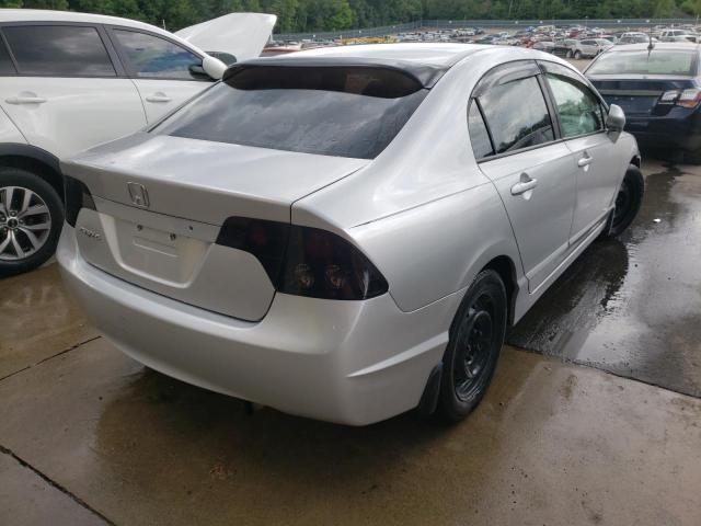 Photo 4 from auction – 2006 HONDA CIVIC LX with VIN 1HGFA16556L058064
