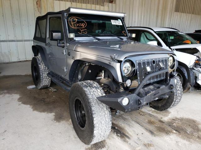 JEEP WRANGLER S 2015 with VIN 1C4AJWAG7FL687579 - Photo from auction