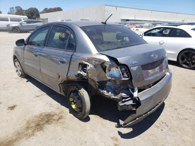 Photo 3 from auction – 2011 KIA RIO BASE with VIN KNADH4A33B6753089