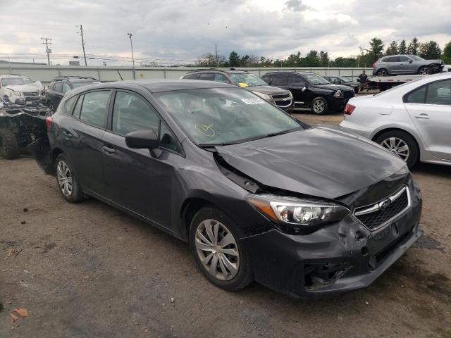 SUBARU IMPREZA 2019 with VIN 4S3GTAA66K3751636 - Photo from auction