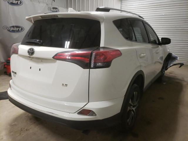 Photo 4 from auction – 2018 TOYOTA RAV4 LE with VIN JTMZFREV7JJ177736