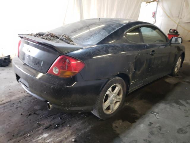 Photo 4 from auction – 2004 HYUNDAI TIBURON with VIN KMHHM65DX4U151024