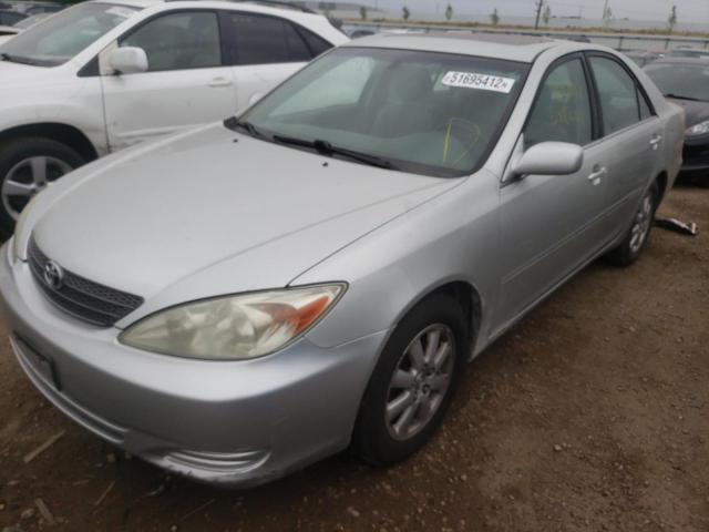 Photo 2 from auction – 2002 TOYOTA CAMRY LE with VIN JTDBF30K520003165