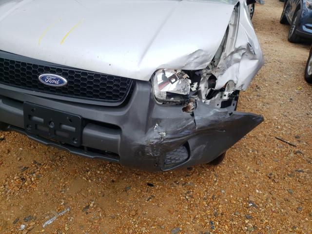 Photo 9 from auction – 2003 FORD ESCAPE XLS with VIN 1FMYU02103KB82896
