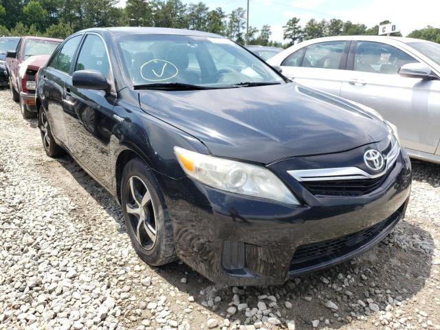 TOYOTA CAMRY HYBR 2011 with VIN 4T1BB3EKXBU142572 - Photo from auction