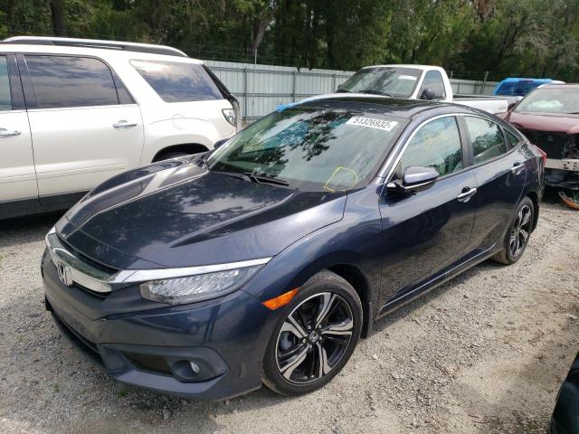 Photo 2 from auction – 2017 HONDA CIVIC TOUR with VIN 19XFC1F99HE021011