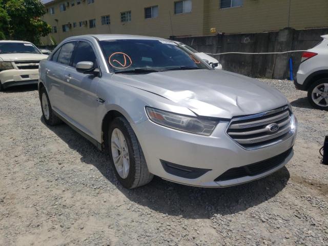 FORD TAURUS SEL 2013 with VIN 1FAHP2E8XDG142125 - Photo from auction