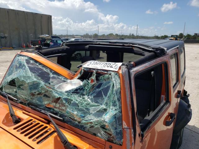 Photo 9 from auction – 2011 JEEP WRANGLER U with VIN 1J4BA3H15BL586582