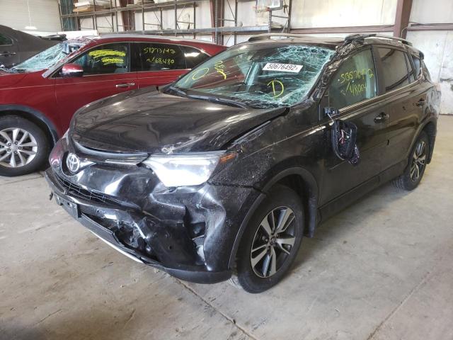 Photo 2 from auction – 2017 TOYOTA RAV4 XLE with VIN 2T3RFREV2HW620984