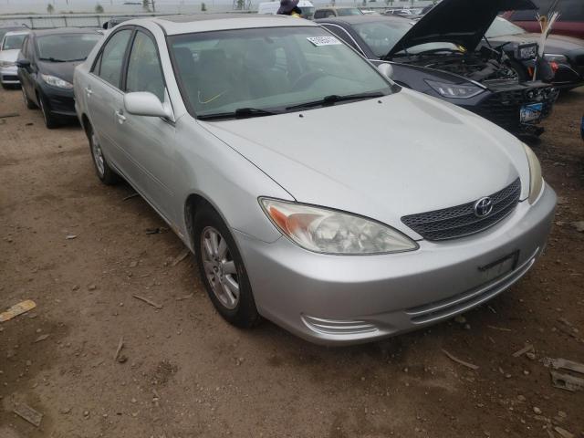 TOYOTA CAMRY LE 2002 with VIN JTDBF30K520003165 - Photo from auction