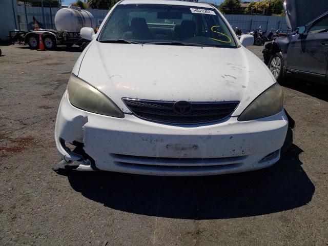Photo 9 from auction – 2003 TOYOTA CAMRY LE with VIN 4T1BF32K13U054777