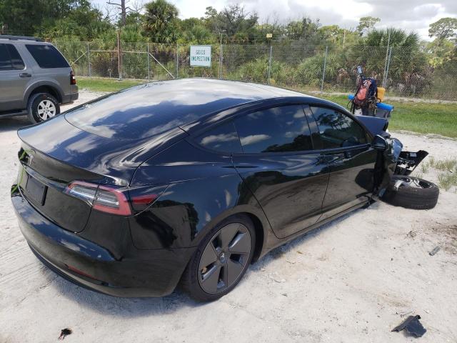 Photo 4 from auction – 2021 TESLA MODEL 3 with VIN 5YJ3E1EAXMF084261