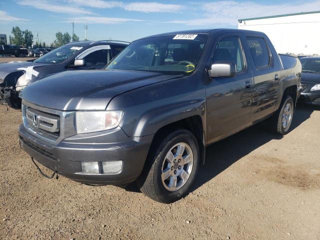 Photo 2 from auction – 2011 HONDA RIDGELINE with VIN 5FPYK1F52BB502400