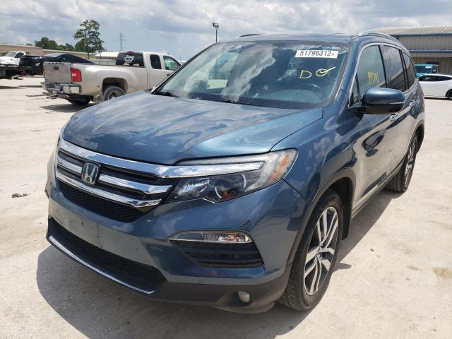 Photo 2 from auction – 2018 HONDA PILOT TOUR with VIN 5FNYF5H94JB014195
