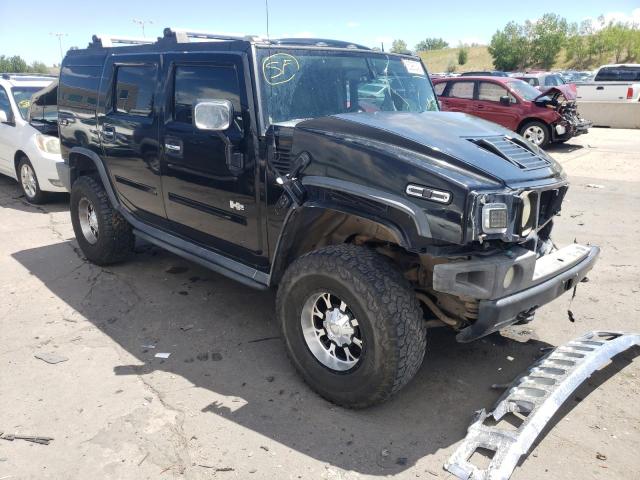 HUMMER H2 2004 with VIN 5GRGN23U24H120415 - Photo from auction